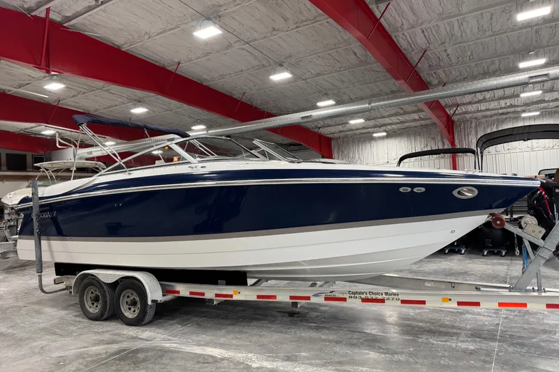 The Image of 2007 Cobalt 282 boat on trailer in indoor storage facility. - 1