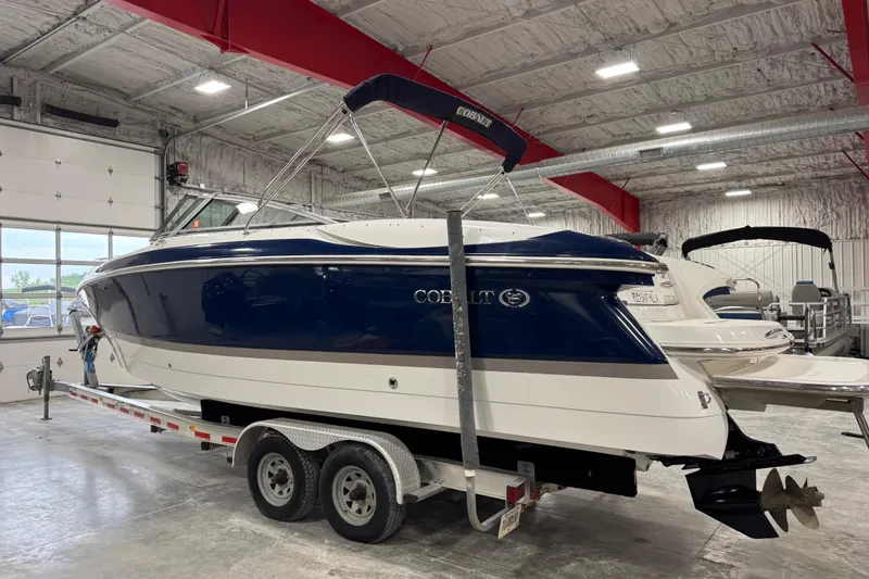 Slide: The Image of 2007 Cobalt 282 boat on trailer in indoor storage facility. - 3