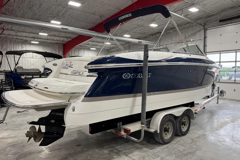 Slide: The Image of 2007 Cobalt 282 boat on trailer in indoor storage facility. - 4