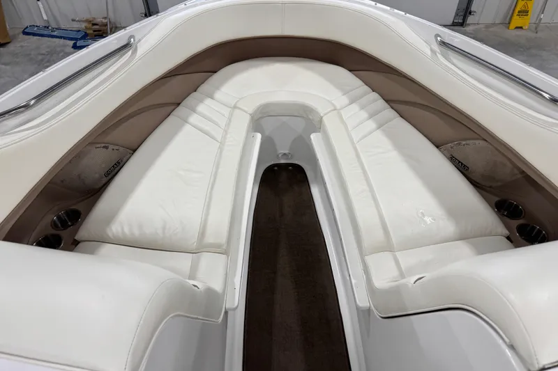 Slide: The Image of Luxurious interior of a 2007 Cobalt 282 boat with white leather seating. - 8