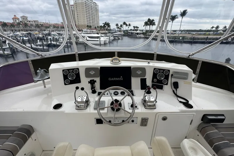 Slide: The Image of Cockpit of 2007 Jefferson Pilothouse 52 SE yacht with steering wheel and navigation controls. - 19