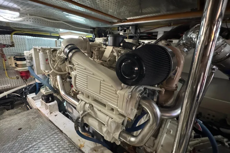 Slide: The Image of Engine room of 2007 Jefferson Pilothouse 52 SE yacht, showcasing powerful machinery. - 36
