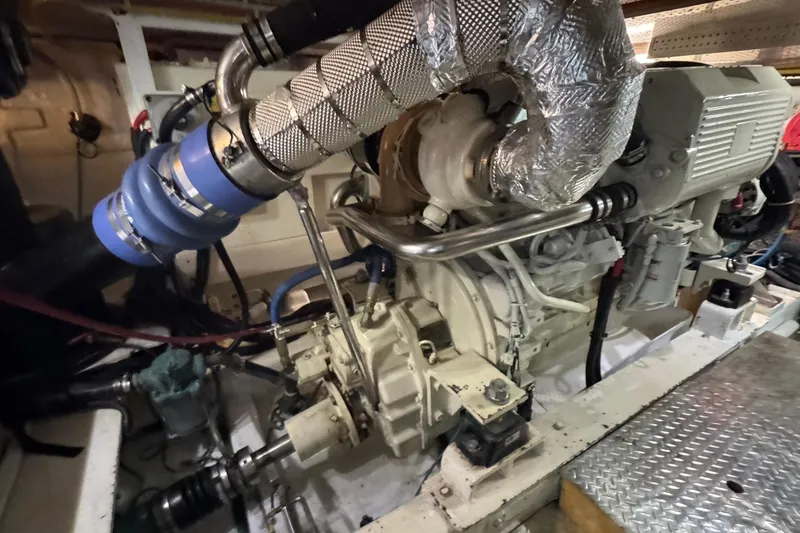 Slide: The Image of Engine room of a 2007 Jefferson Pilothouse 52 SE yacht, showcasing mechanical components. - 37