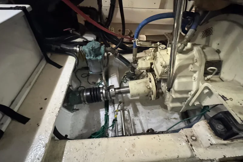 Slide: The Image of Engine room of a 2007 Jefferson Pilothouse 52 SE yacht, showing mechanical components. - 38