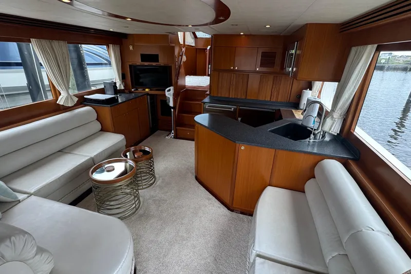 Slide: The Image of Luxurious interior of 2007 Jefferson Pilothouse 52 SE yacht with modern furnishings. - 9