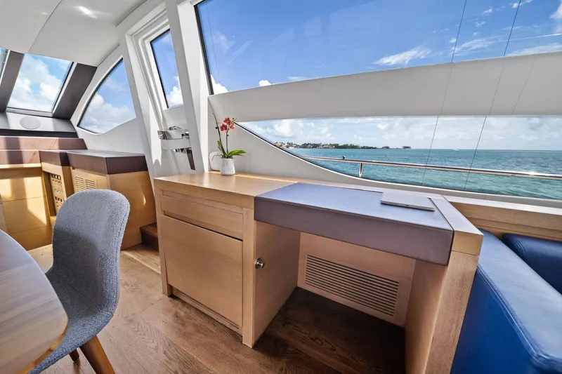 Slide: The Image of Luxurious interior of 2013 Pershing 82 yacht with ocean view and modern furnishings. - 31