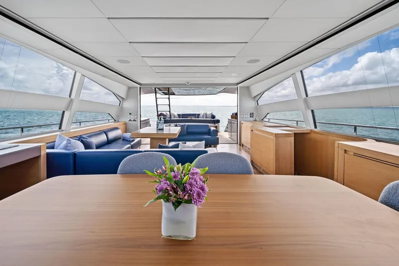 Slide: The Image of Luxurious interior of 2013 Pershing 82 yacht with ocean view and elegant furnishings. - 34