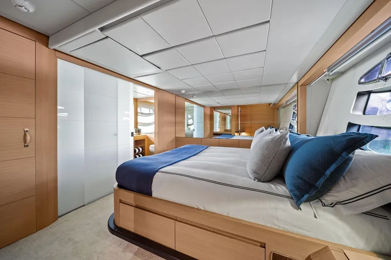 Slide: The Image of Luxurious bedroom interior of 2013 Pershing 82 yacht with modern design and elegant furnishings. - 35