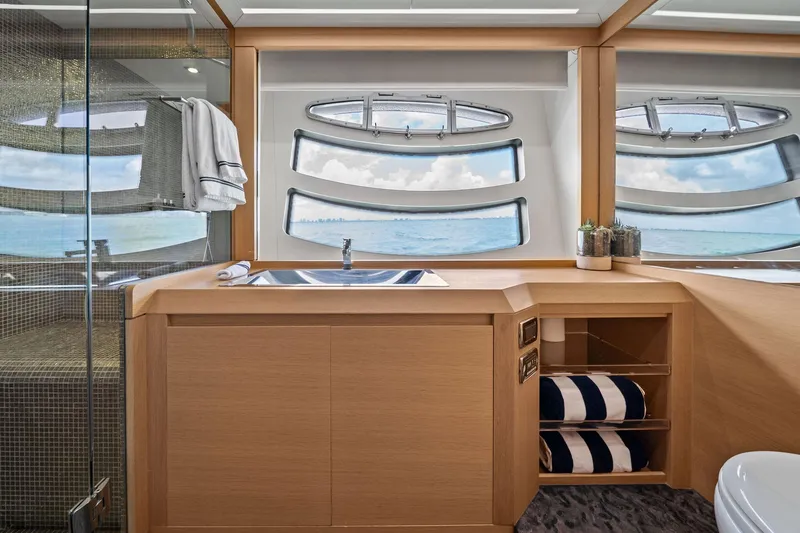 Slide: The Image of Luxurious bathroom interior on 2013 Pershing 82 yacht with ocean view windows. - 37
