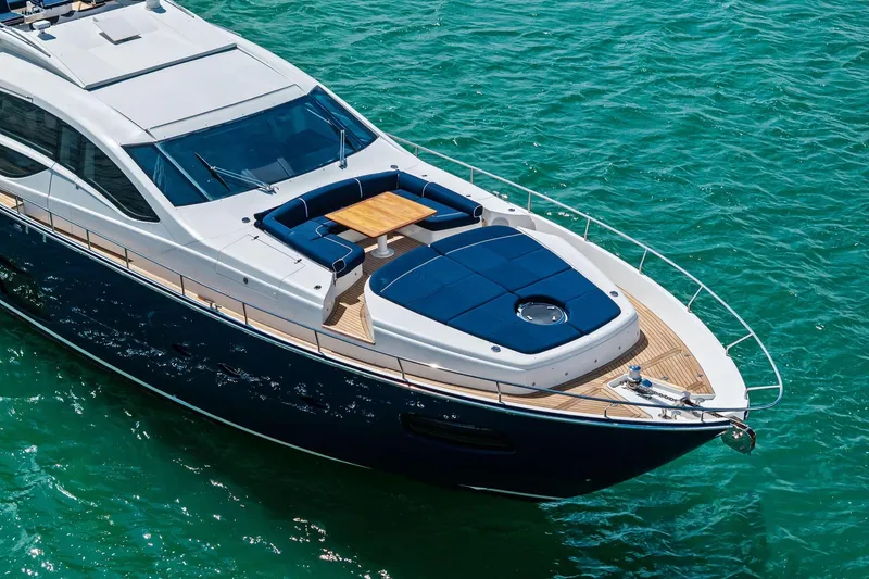 Slide: The Image of Luxurious 2013 Pershing 82 yacht with sleek design on turquoise water. - 7