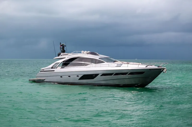 The Image of Luxury Pershing 8X yacht from 2021 on turquoise waters under cloudy skies. - 1