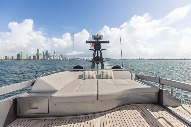 Slide: The Image of Luxurious 2021 Pershing 8X yacht deck with city skyline view. - 24