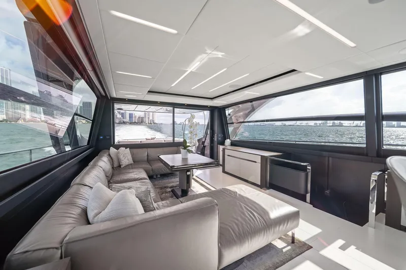 Slide: The Image of Luxurious interior of 2021 Pershing 8X yacht with panoramic ocean views and modern furnishings. - 29