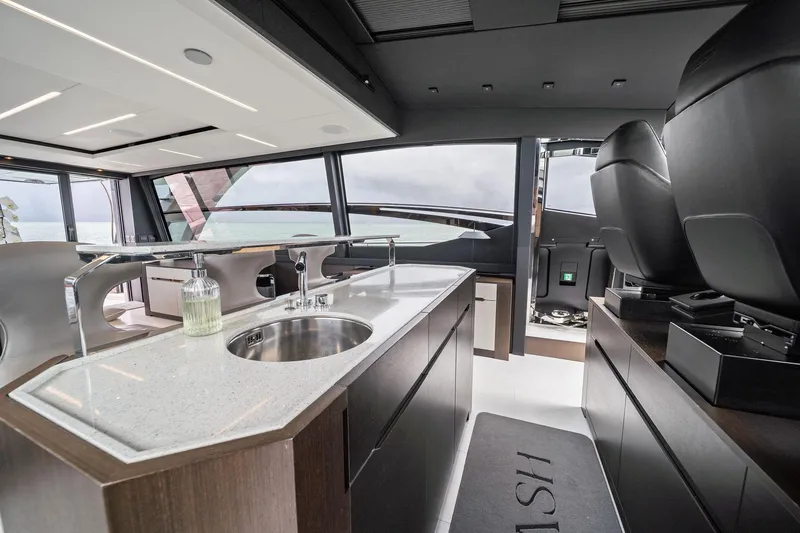 Slide: The Image of Luxurious interior of 2021 Pershing 8X yacht featuring modern kitchen and sleek design. - 33