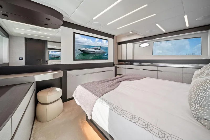 Slide: The Image of Luxurious interior of 2021 Pershing 8X yacht bedroom with modern design and elegant furnishings. - 35