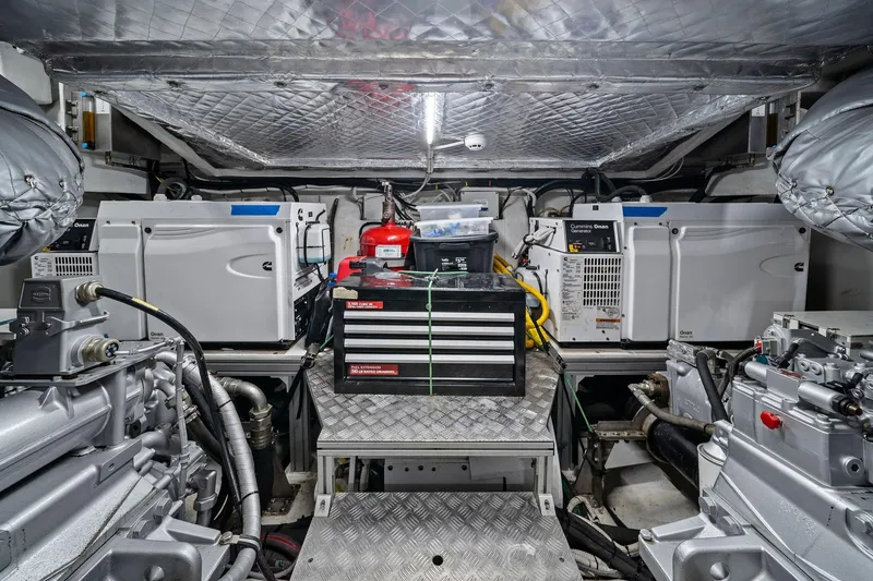 Slide: The Image of Engine room of a 2021 Pershing 8X yacht with generators and equipment. - 45