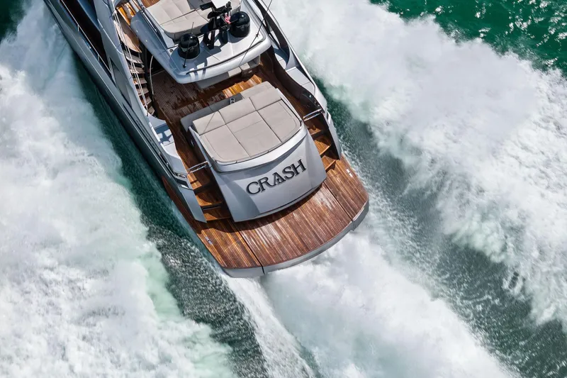 Slide: The Image of Aerial view of 2021 Pershing 8X yacht cruising through ocean waves. - 9