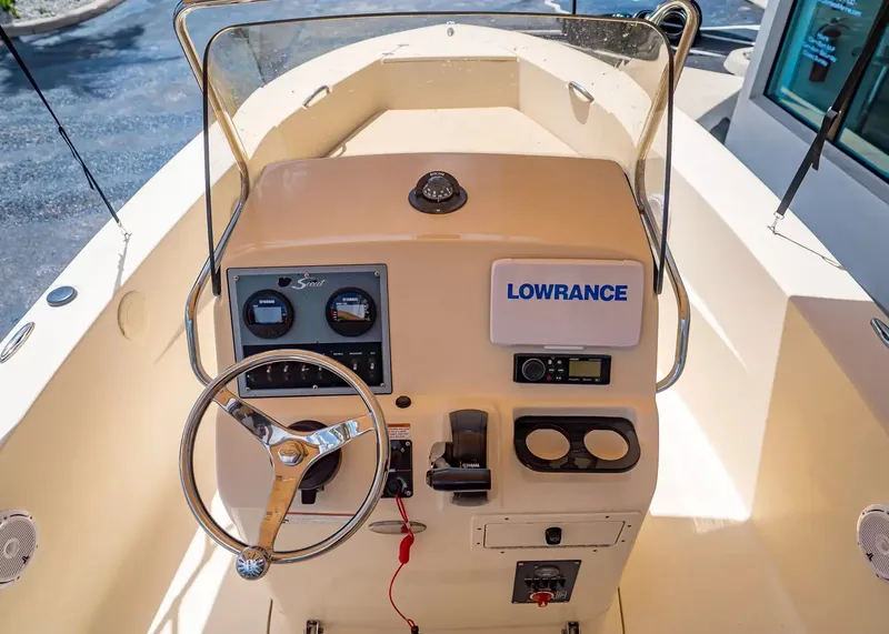 Slide: The Image of Scout 195 Sportfish 2022 helm with Lowrance device. - 13