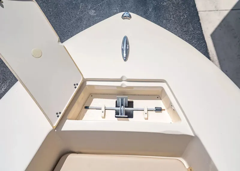 Slide: The Image of Scout 195 Sportfish 2022 boat deck with storage compartment. - 19