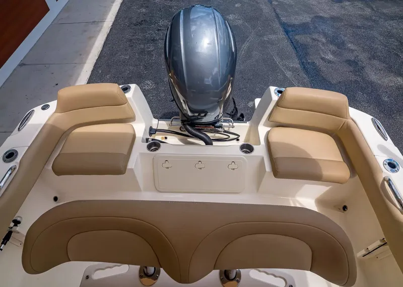 Slide: The Image of Interior view of 2022 Scout 195 Sportfish with beige seating. - 6