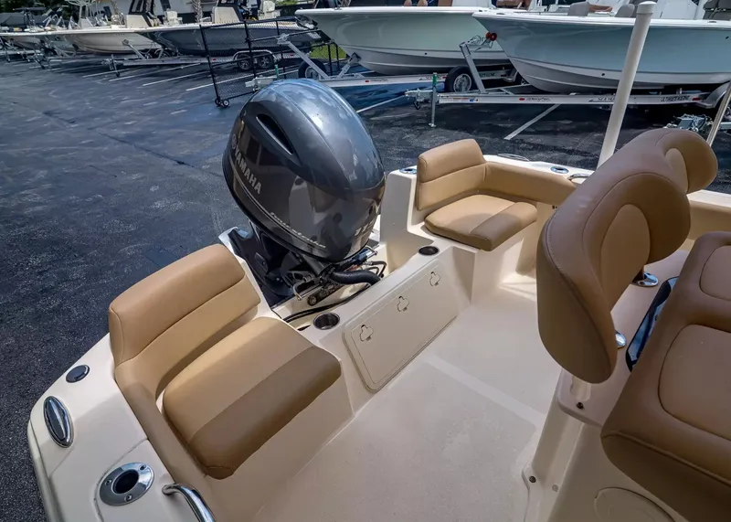 Slide: The Image of Scout 195 Sportfish 2022 with Yamaha engine, beige seating. - 7