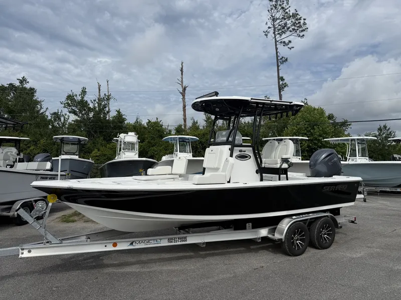 The Image of 2026 Sea Pro 230 Bay boat with YAMAHA 200 engine on trailer. - 1