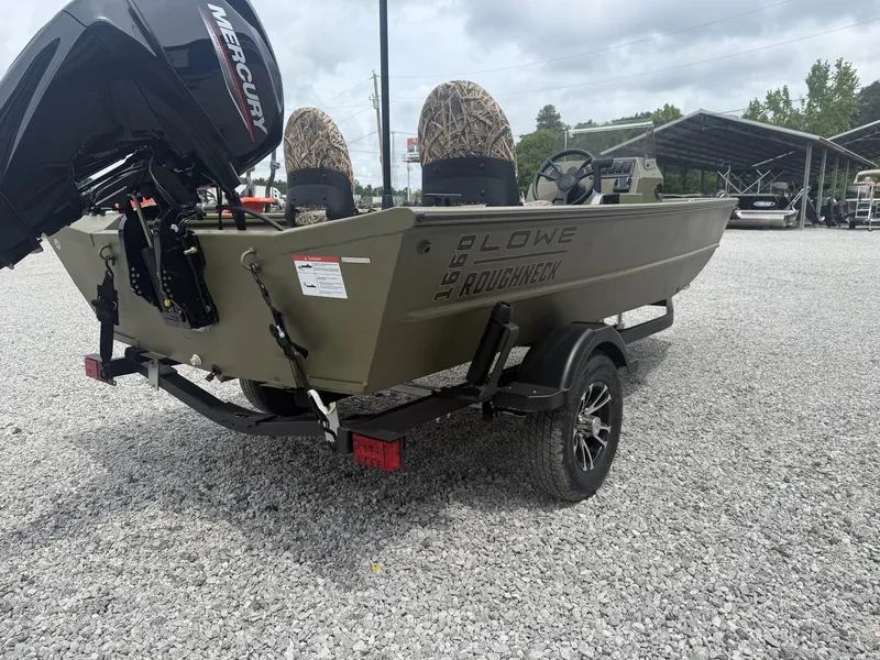 Slide: The Image of 2026 Lowe Roughneck 1650SC boat with Mercury engine on trailer. - 3