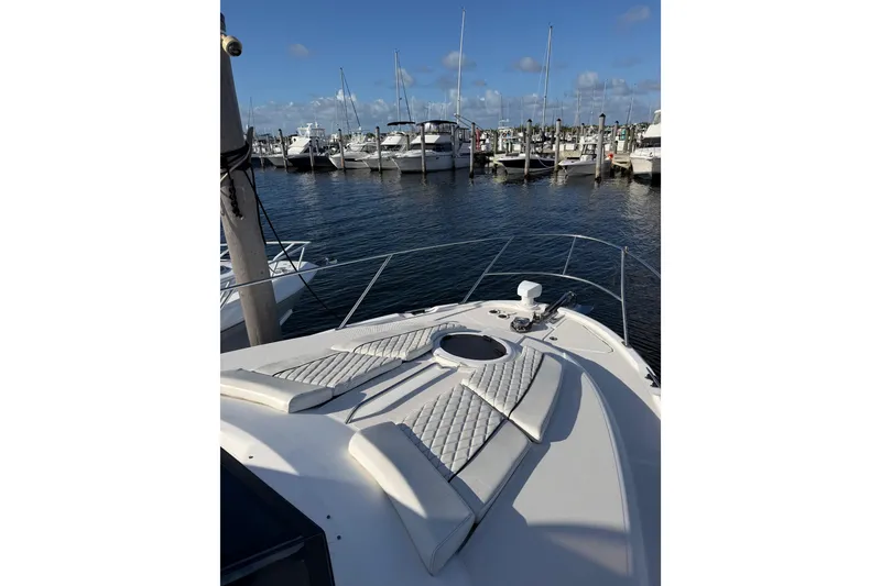 Slide: The Image of 2006 Meridian 341 Sedan yacht docked at marina with clear sky. - 12