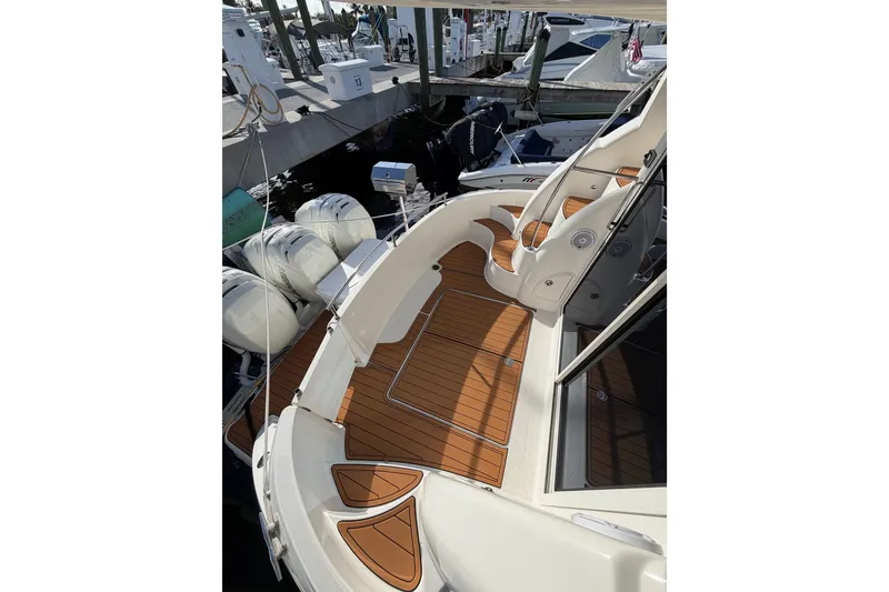 Slide: The Image of 2006 Meridian 341 Sedan yacht with teak deck at marina. - 14