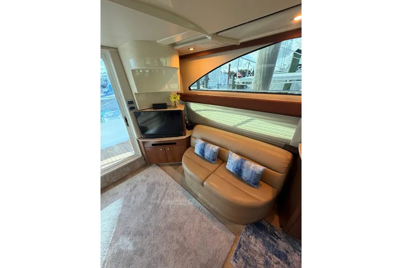Slide: The Image of Interior of 2006 Meridian 341 Sedan yacht with leather seating and TV. - 21