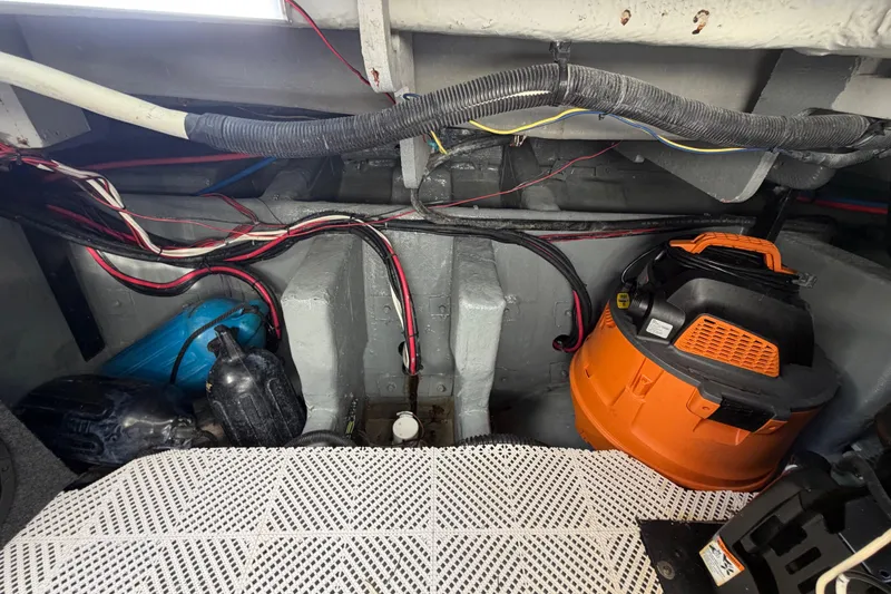 Slide: The Image of Engine compartment of a 2006 Meridian 341 Sedan with wiring and equipment. - 29