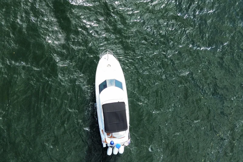 Slide: The Image of Aerial view of 2006 Meridian 341 Sedan boat cruising on open water. - 9