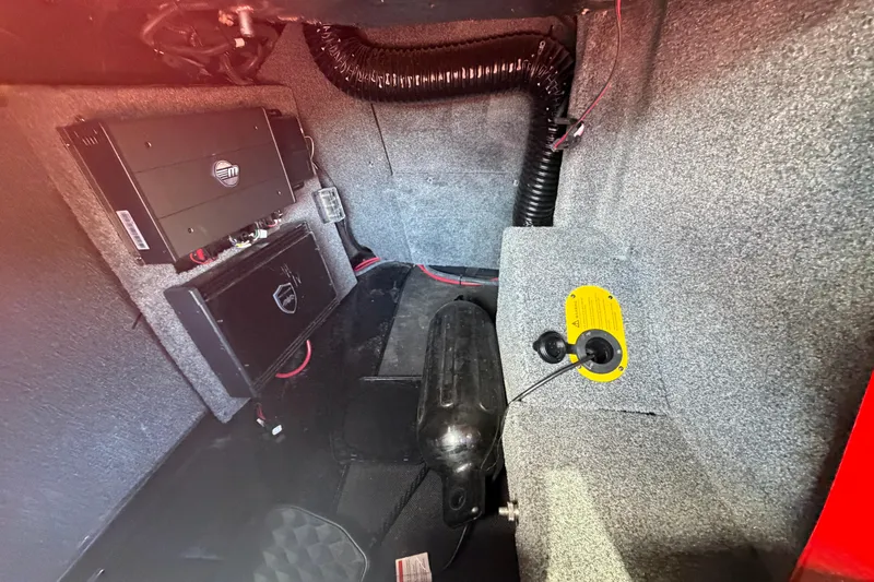 Slide: The Image of 2021 Malibu M220 interior showing audio system components and wiring setup. - 20
