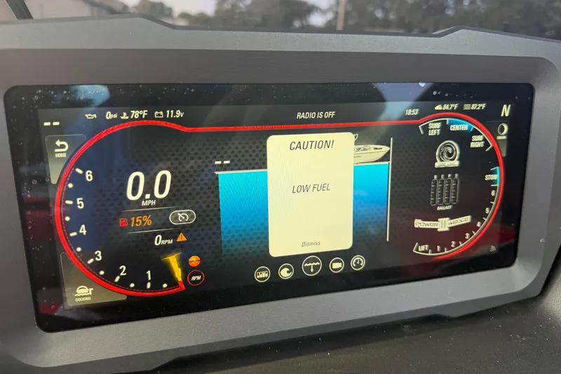 Slide: The Image of Dashboard display of a 2021 Malibu M220 showing low fuel warning. - 27