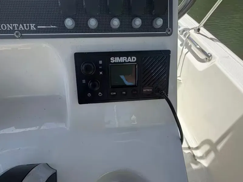 Slide: The Image of Simrad control panel on a 2024 Boston Whaler 17 Montauk boat. - 10