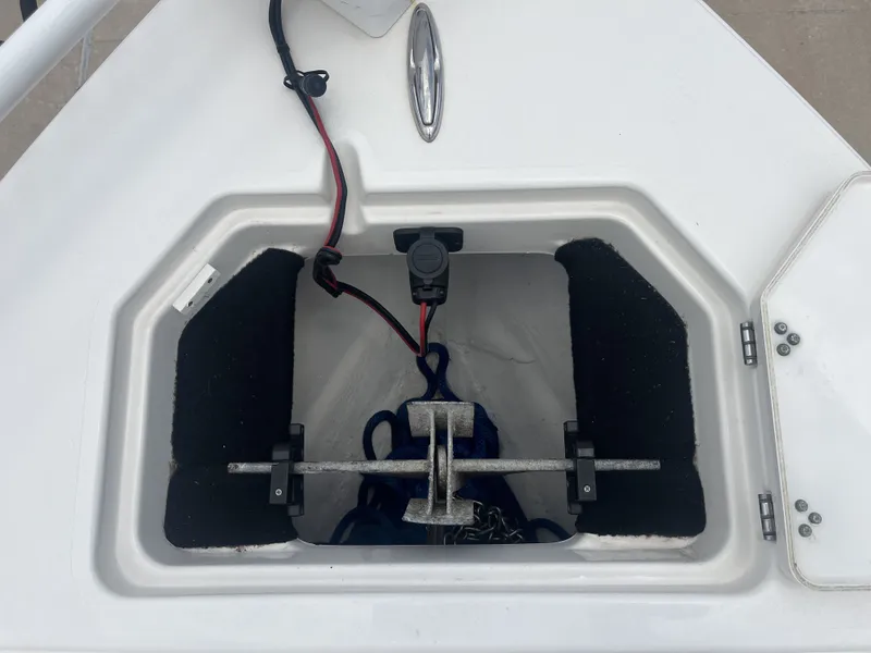 Slide: The Image of Anchor compartment of a 2022 Pathfinder 2400 boat. - 19