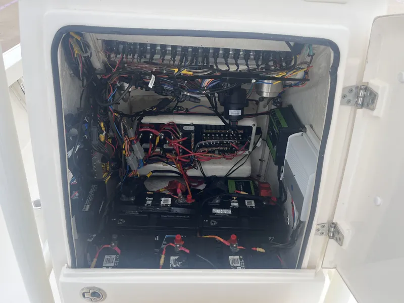 Slide: The Image of Electrical compartment of a 2022 Pathfinder 2400 boat. - 23