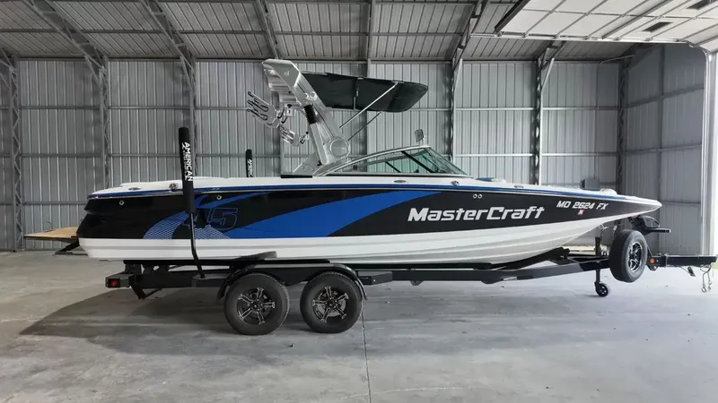 The Image of 2012 MasterCraft X-45 boat in warehouse on trailer. - 1