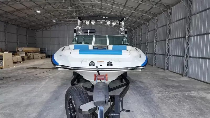 Slide: The Image of 2012 MasterCraft X-45 boat in warehouse on trailer. - 10