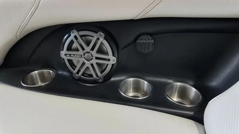 Slide: The Image of MasterCraft X-45 2012 speaker and cup holders detail view. - 14