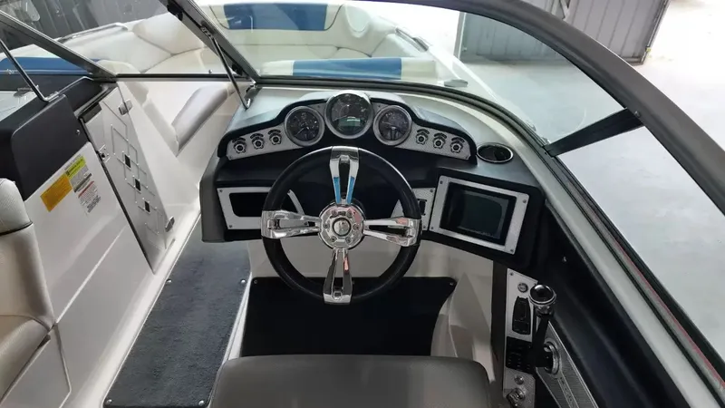 Slide: The Image of Interior view of 2012 MasterCraft X-45 boat with steering console. - 21