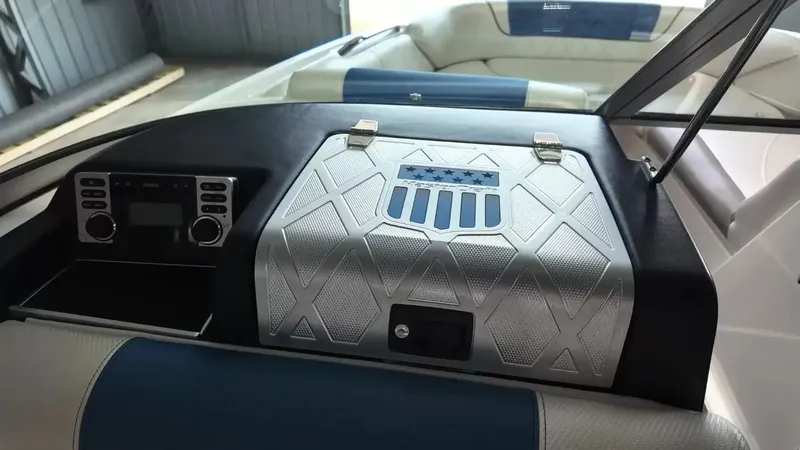 Slide: The Image of Interior of a 2012 MasterCraft X-45 boat with control console. - 25