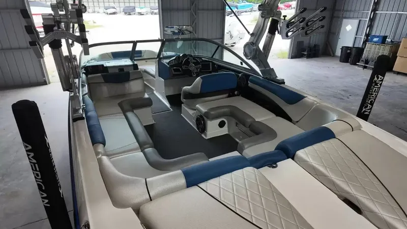 Slide: The Image of Interior of a 2012 MasterCraft X-45 boat in a garage. - 39