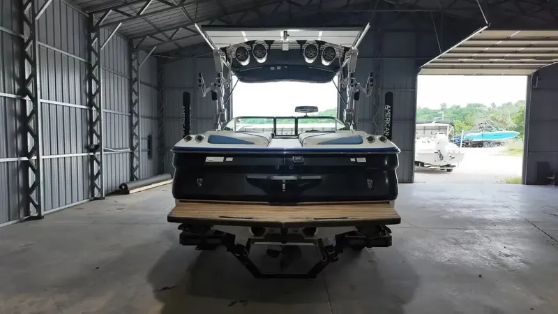 Slide: The Image of 2012 MasterCraft X-45 boat parked in a storage facility. - 5