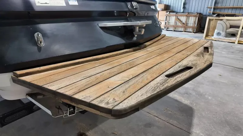 Slide: The Image of Wooden platform of a 2012 MasterCraft X-45 boat in a workshop. - 7