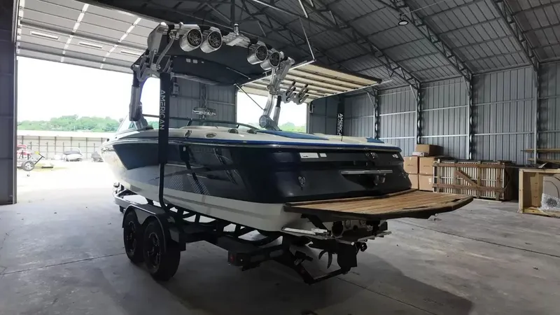 Slide: The Image of 2012 MasterCraft X-45 boat parked in a storage facility. - 8