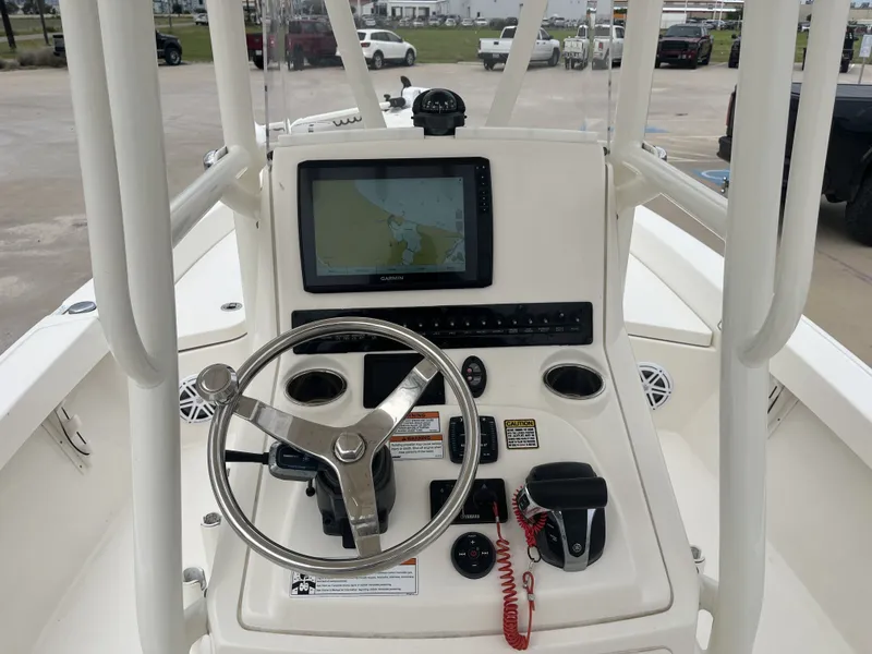 Slide: The Image of Control console of a 2022 Pathfinder 2400 boat. - 34