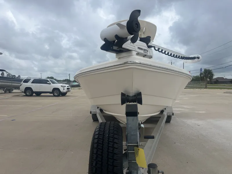 Slide: The Image of 2022 Pathfinder 2400 boat on trailer, cloudy sky. - 5