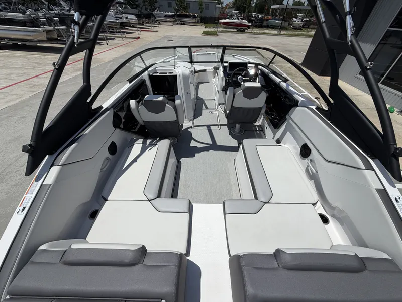 Slide: The Image of Interior view of 2024 Yamaha Boats AR250 with modern seating. - 12
