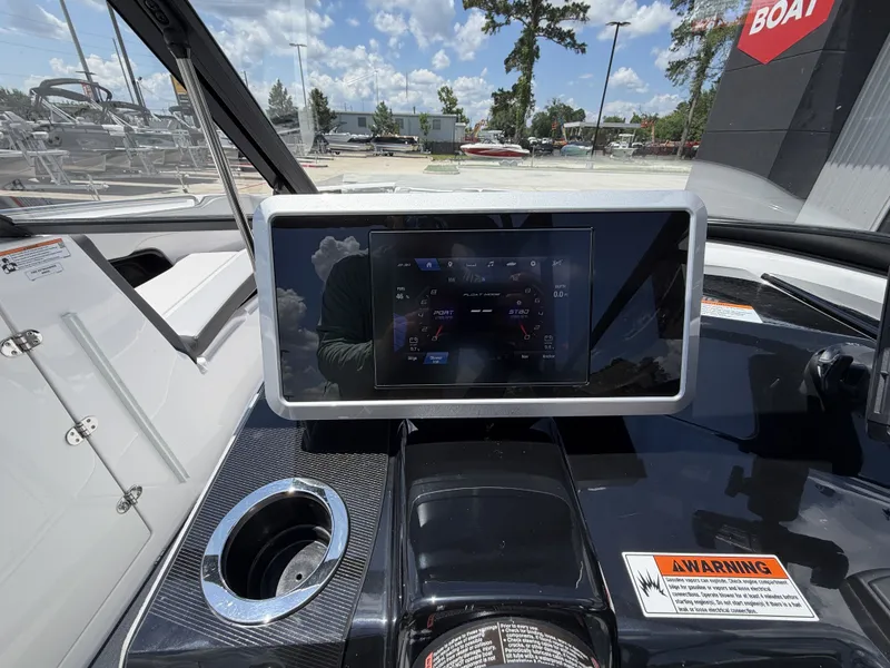 Slide: The Image of Yamaha Boats 2024 AR250 dashboard with touchscreen display. - 24